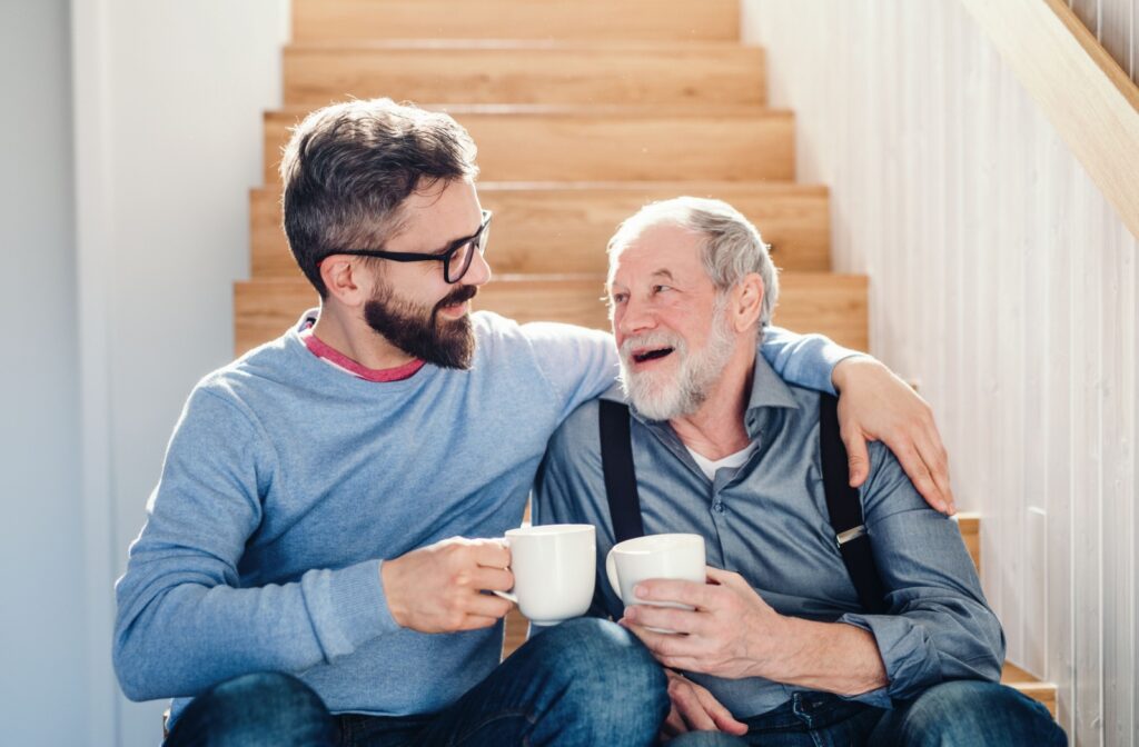 An adult child has an open conversation with their mature parent about why they should consider memory care.